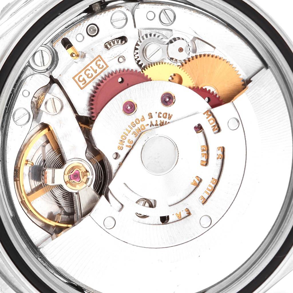 This image shows an angled view of the internal mechanism of a Rolex Turn-o-Graph 16264 Men
s Stainless Steel Blue Dial 16264 Men
s Stainless Steel Blue Dial watch, highlighting gears and intricate parts.