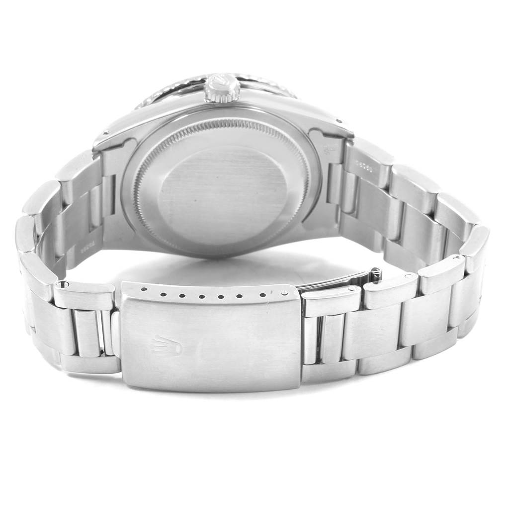 The image shows the back view of a Rolex Turn-o-Graph 16264 Men
s Stainless Steel Blue Dial 16264 Men
s Stainless Steel Blue Dial watch, highlighting its case back and metal bracelet with a clasp.