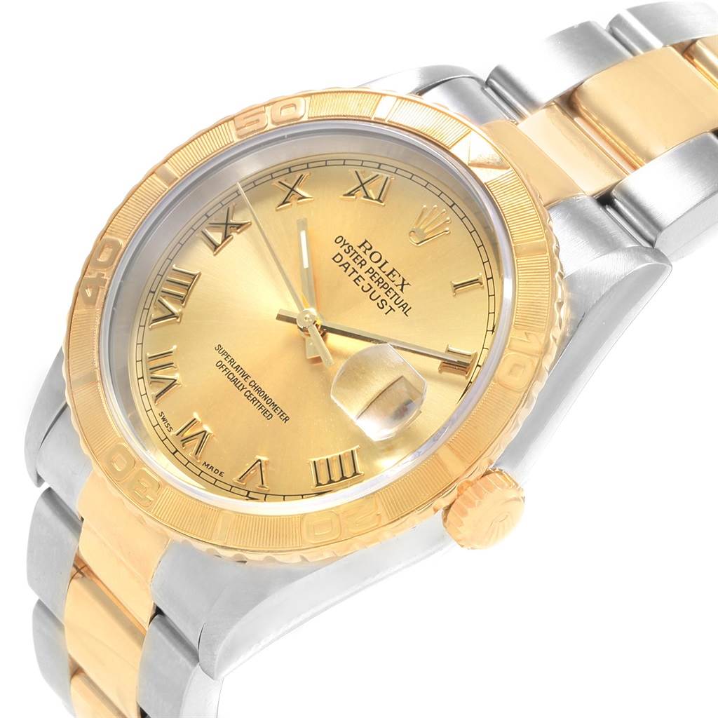 This image shows a Rolex Turn-o-Graph 16263 Men's Steel and Gold (two tone) Champagne Dial 16263 Men's Steel and Gold (two tone) Champagne Dial watch at a tilted angle, revealing the dial, bezel, crown, and part of the bracelet.
