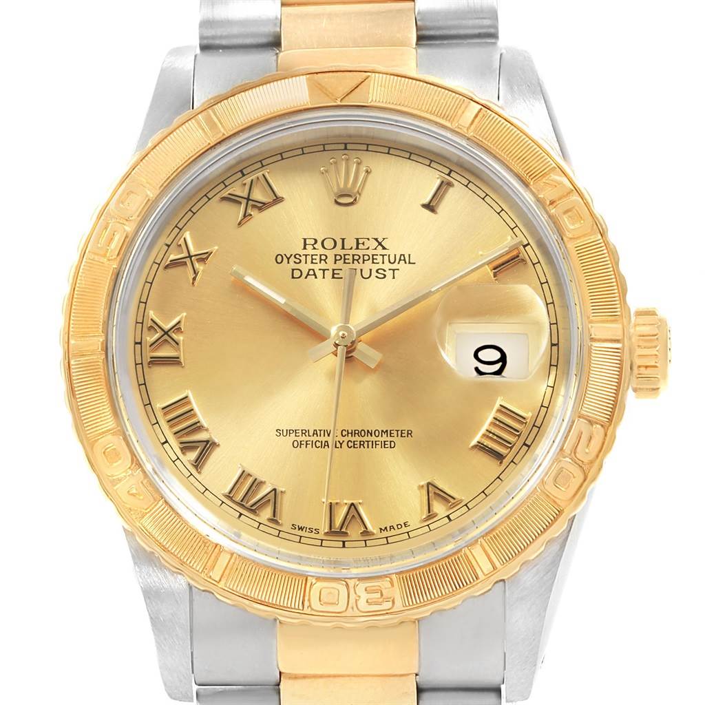 This image shows a close-up frontal view of the Rolex Turn-o-Graph 16263 Men's Steel and Gold (two tone) Champagne Dial 16263 Men's Steel and Gold (two tone) Champagne Dial Datejust, highlighting the gold dial and bezel.
