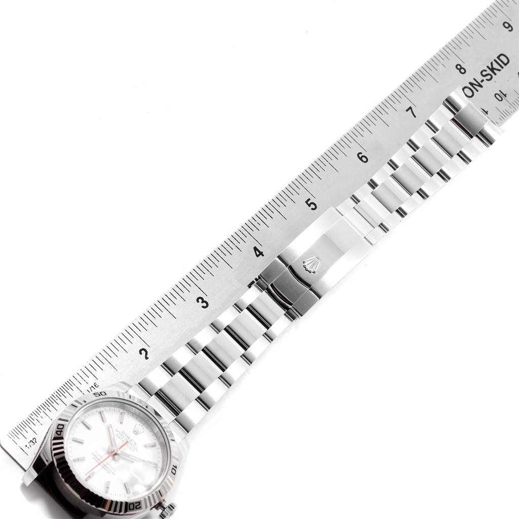 The image shows the dial and bracelet of a Rolex Turn-o-Graph 116264 Men's Stainless Steel White Dial 116264 Men's Stainless Steel White Dial watch, measured against a ruler.