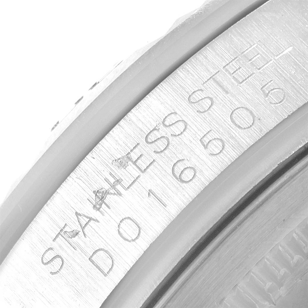The image shows a close-up of the case side with engraved text on the Rolex Turn-o-Graph 116264 Men's Stainless Steel White Dial 116264 Men's Stainless Steel White Dial watch.