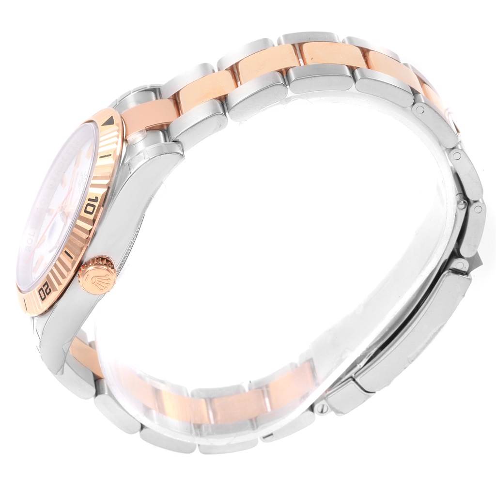 This image shows the side angle of the Rolex Turn-o-Graph 116261 Men's Stainless Steel White Dial 116261 Men's Stainless Steel White Dial watch, highlighting its crown, bezel, and two-tone bracelet.