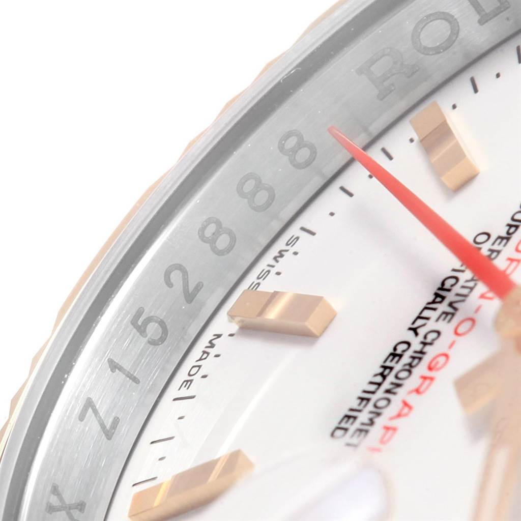 The close-up image of the Rolex Turn-o-Graph 116261 Men's Stainless Steel White Dial 116261 Men's Stainless Steel White Dial watch shows a partial view of the dial, bezel, and markers.