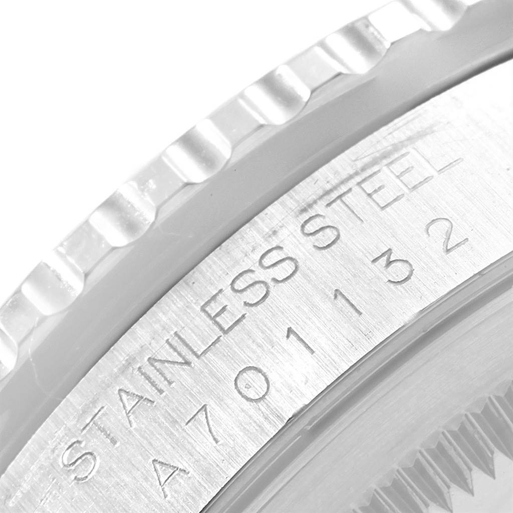 The image shows a close-up detail of the stainless steel bezel and engraved serial number of a Rolex Turn-o-Graph 16264 Men's Stainless Steel Silver Dial 16264 Men's Stainless Steel Silver Dial watch.