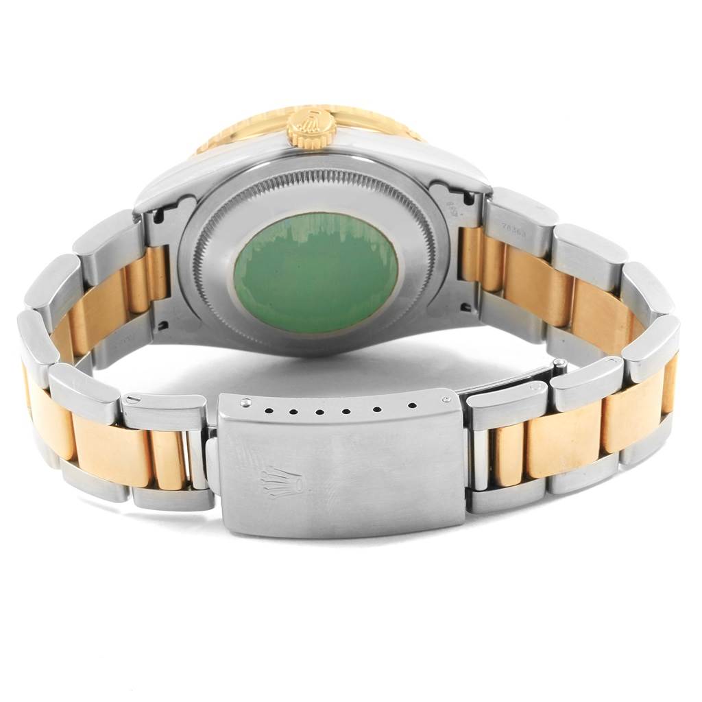 The image shows the back of a Rolex Turn-o-Graph 16263 Men's Steel and Gold (two tone) Black Dial 16263 Men's Steel and Gold (two tone) Black Dial watch, including the case back and the bracelet clasp.