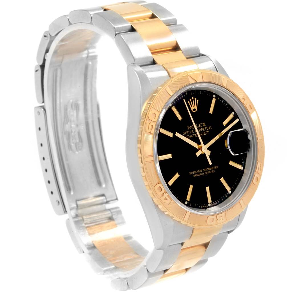 This image shows the Rolex Turn-o-Graph 16263 Men's Steel and Gold (two tone) Black Dial 16263 Men's Steel and Gold (two tone) Black Dial watch from a three-quarter angle, highlighting its bracelet, case, bezel, and dial.