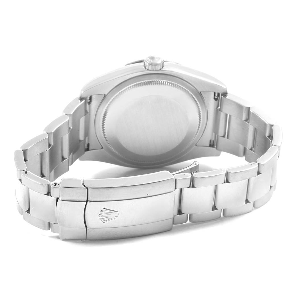 The image shows the back view of a Rolex Turn-o-Graph 116264 Men
s Stainless Steel Black Dial 116264 Men
s Stainless Steel Black Dial watch, focusing on the case back and the stainless steel bracelet with the clasp.