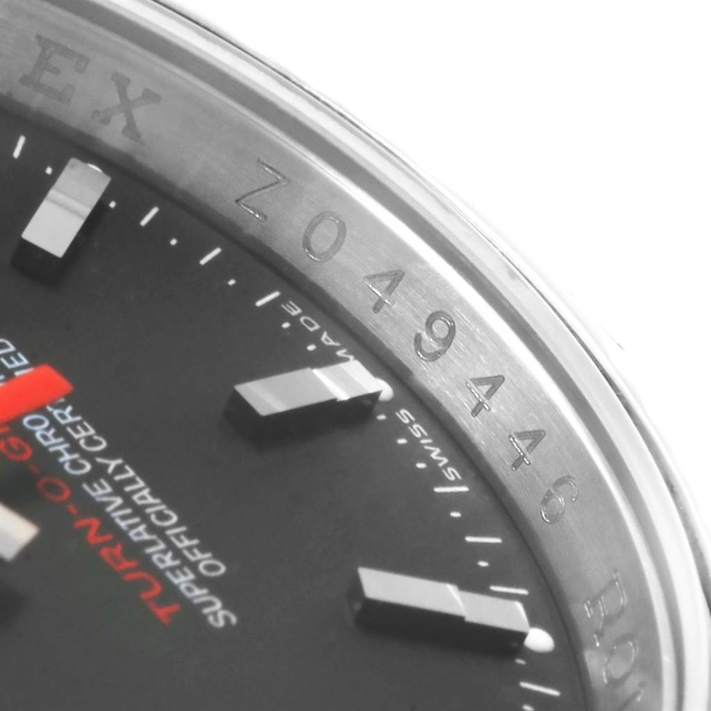 This image shows a close-up of the dial and the serial number on the bezel of the Rolex Turn-o-Graph 116264 Men
s Stainless Steel Black Dial 116264 Men
s Stainless Steel Black Dial watch.