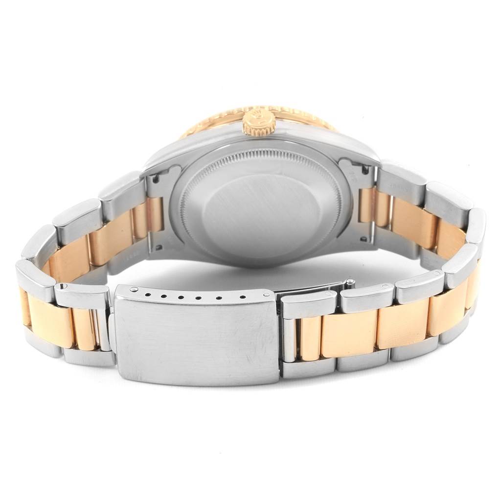 This image shows the back case, crown, and stainless steel and gold bracelet of the Rolex Turn-o-Graph 16263 Men
s Steel and Gold (two tone) Beige Dial 16263 Men
s Steel and Gold (two tone) Beige Dial watch.