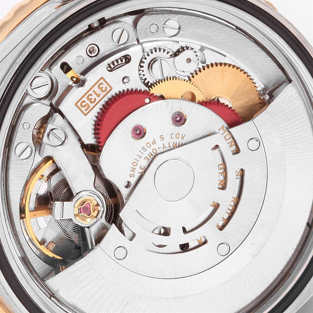 This image shows an angled view of the internal movement and gears of the Rolex Turn-o-Graph 16263 Men
s Steel and Gold (two tone) Beige Dial 16263 Men
s Steel and Gold (two tone) Beige Dial watch.