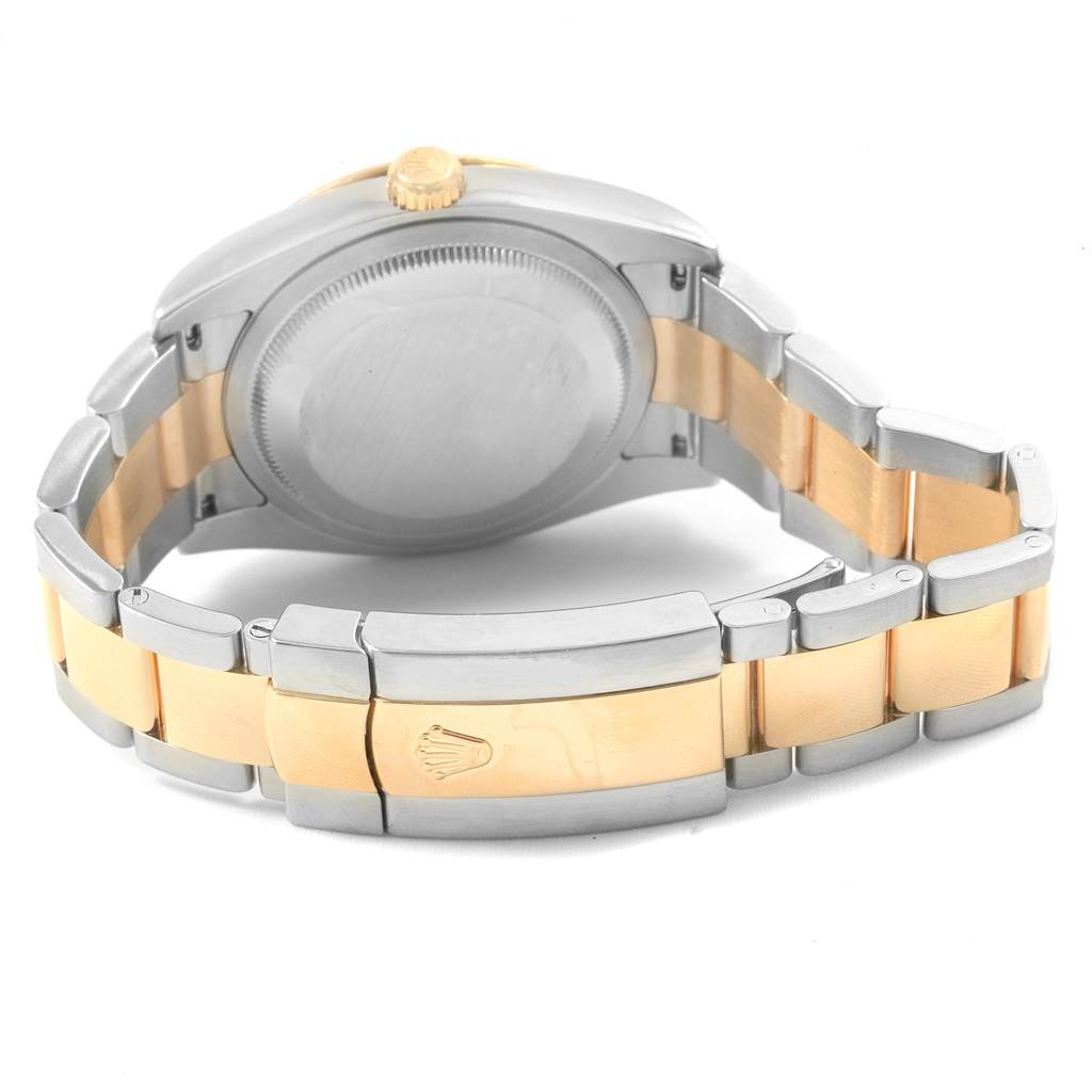 The image shows the back view of a Rolex Turn-o-Graph 116263 Men
s Steel and Gold (two tone) Grey Dial 116263 Men
s Steel and Gold (two tone) Grey Dial watch, highlighting the clasp and part of the bracelet.