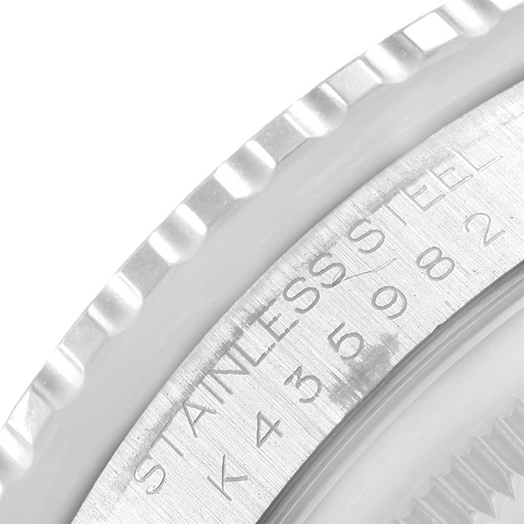 This close-up image of a Rolex Turn-o-Graph 16264 Men
s Stainless Steel White Dial 16264 Men
s Stainless Steel White Dial watch shows part of the stainless steel bezel and engraved details.