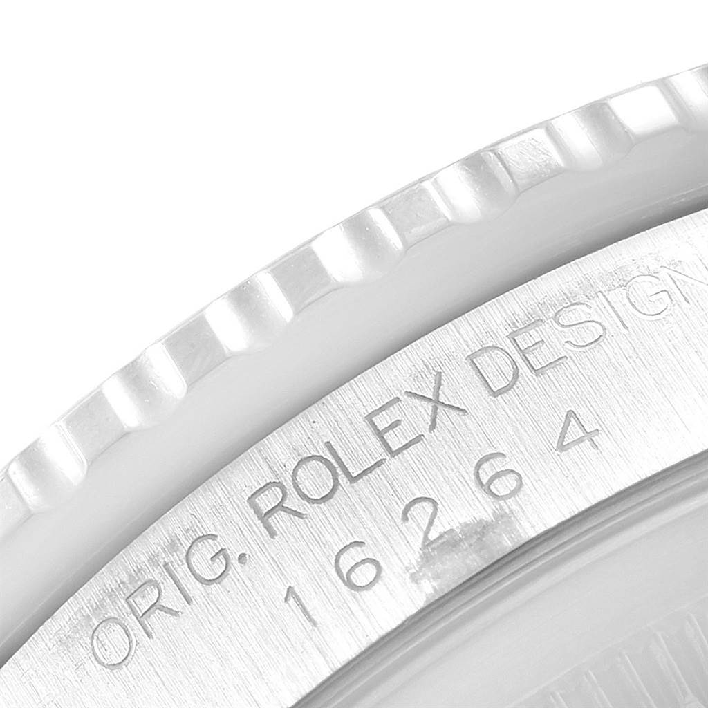 The image shows a close-up of the bezel and case back of a Rolex Turn-o-Graph 16264 Men
s Stainless Steel White Dial 16264 Men
s Stainless Steel White Dial model, highlighting the engraved model number and design details.