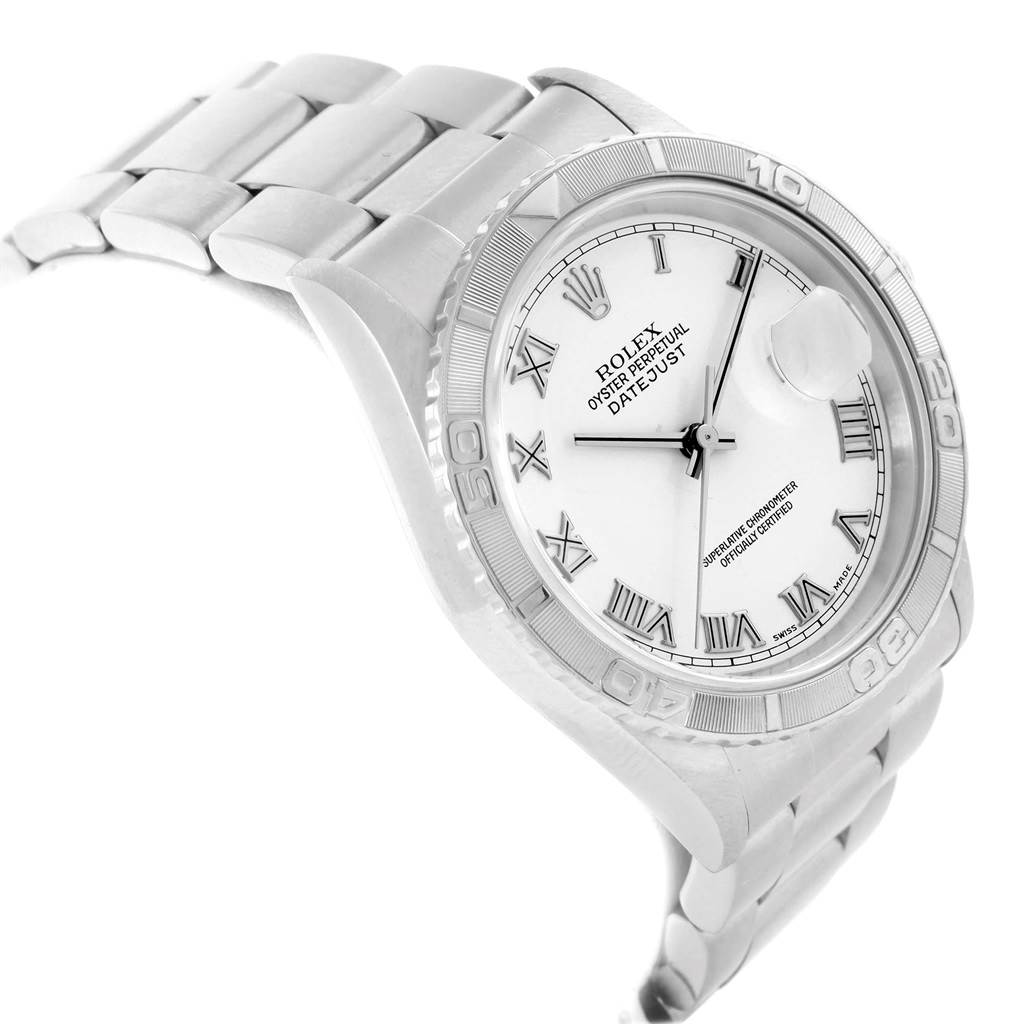 The image shows a side angle of a Rolex Turn-o-Graph 16264 Men
s Stainless Steel White Dial 16264 Men
s Stainless Steel White Dial watch, highlighting its bracelet, dial with Roman numerals, and bezel.