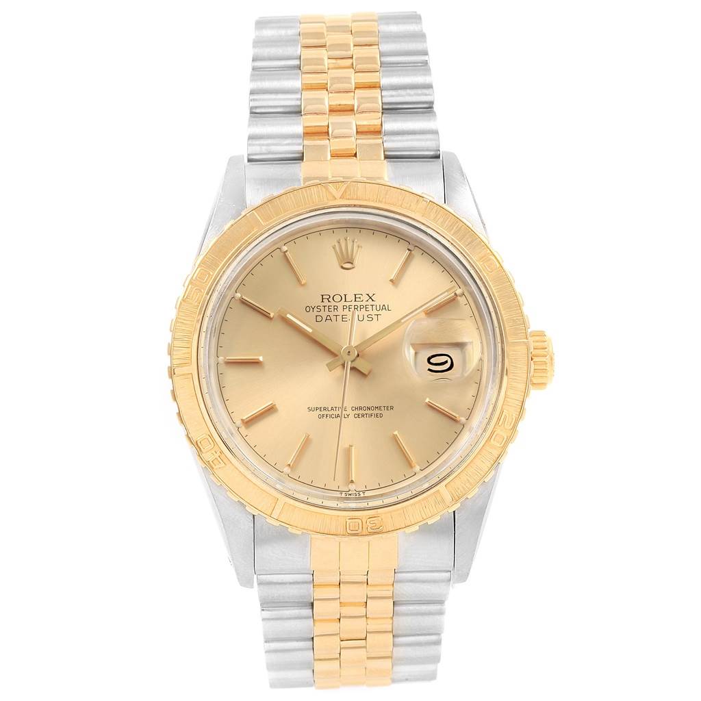 The image shows the front view of a Rolex Turn-o-Graph 16253 Men
s Steel and Gold (two tone) Champagne Dial 16253 Men
s Steel and Gold (two tone) Champagne Dial watch, featuring its dial, bezel, and bracelet.