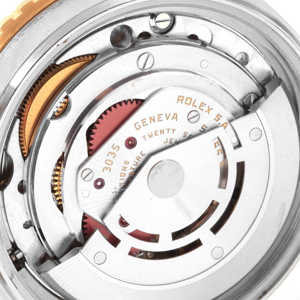 This image shows the detailed inner mechanical movement parts of a Rolex Turn-o-Graph 16253 Men
s Steel and Gold (two tone) Champagne Dial 16253 Men
s Steel and Gold (two tone) Champagne Dial watch from a close-up top angle.