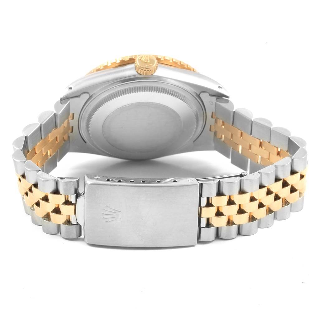 This image shows the back view of a Rolex Turn-o-Graph 16253 Men
s Steel and Gold (two tone) Champagne Dial 16253 Men
s Steel and Gold (two tone) Champagne Dial watch, highlighting its case back, crown, and bi-metal bracelet.