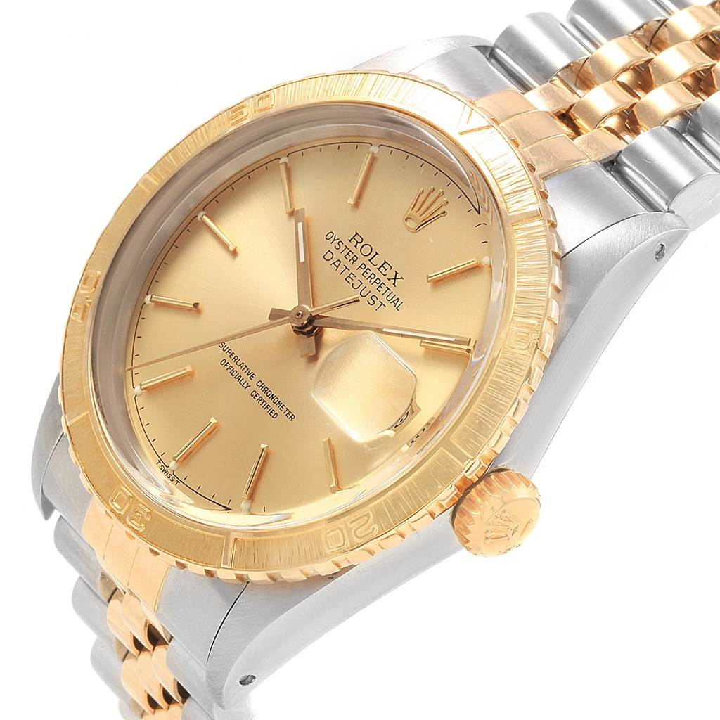 The Rolex Turn-o-Graph 16253 Men
s Steel and Gold (two tone) Champagne Dial 16253 Men
s Steel and Gold (two tone) Champagne Dial watch is shown at a three-quarter angle, displaying the dial, bezel, crown, and part of the bracelet.
