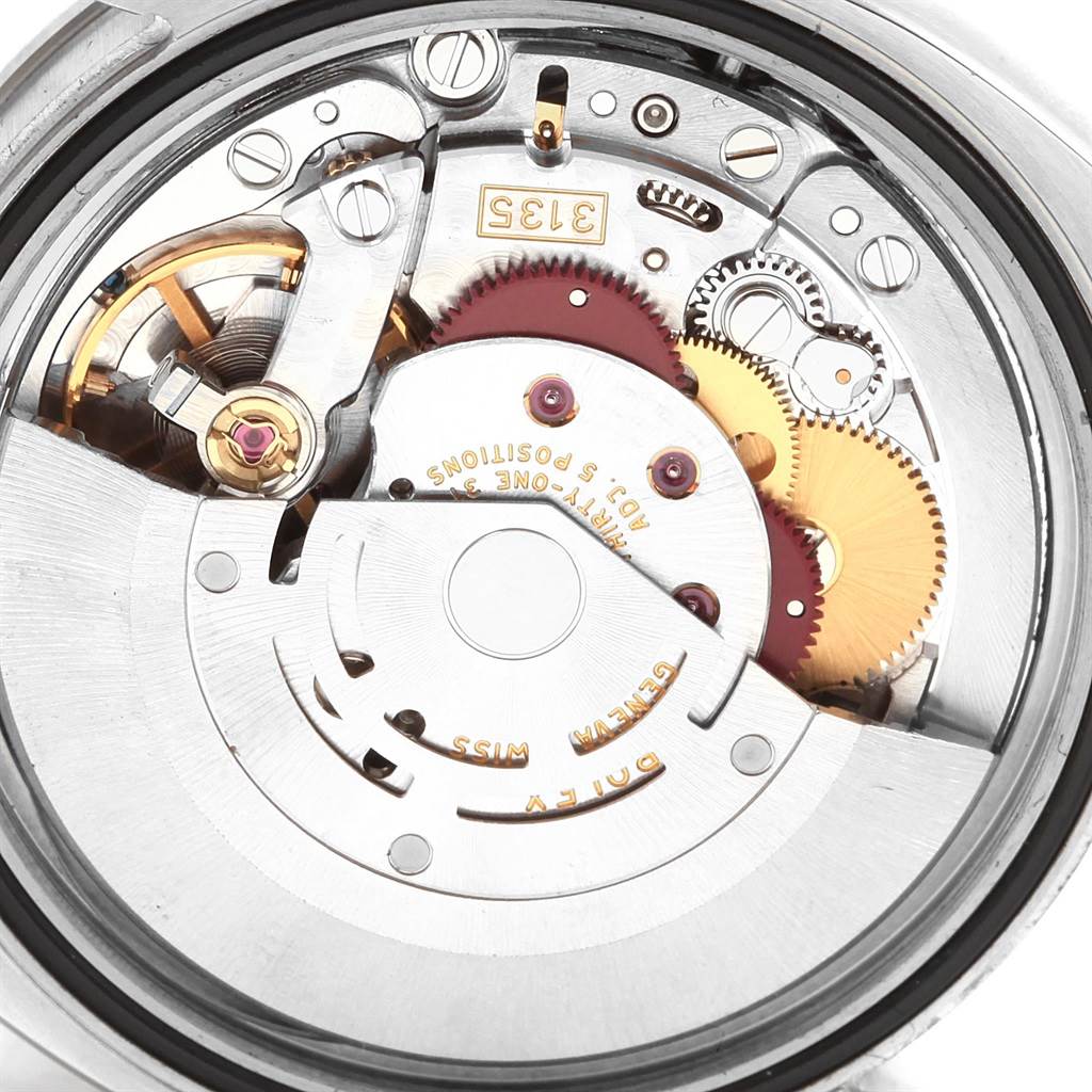 The image shows an angled view of the internal mechanical movement of a Rolex Turn-o-Graph 116264 Men
s Stainless Steel White Dial 116264 Men
s Stainless Steel White Dial watch.