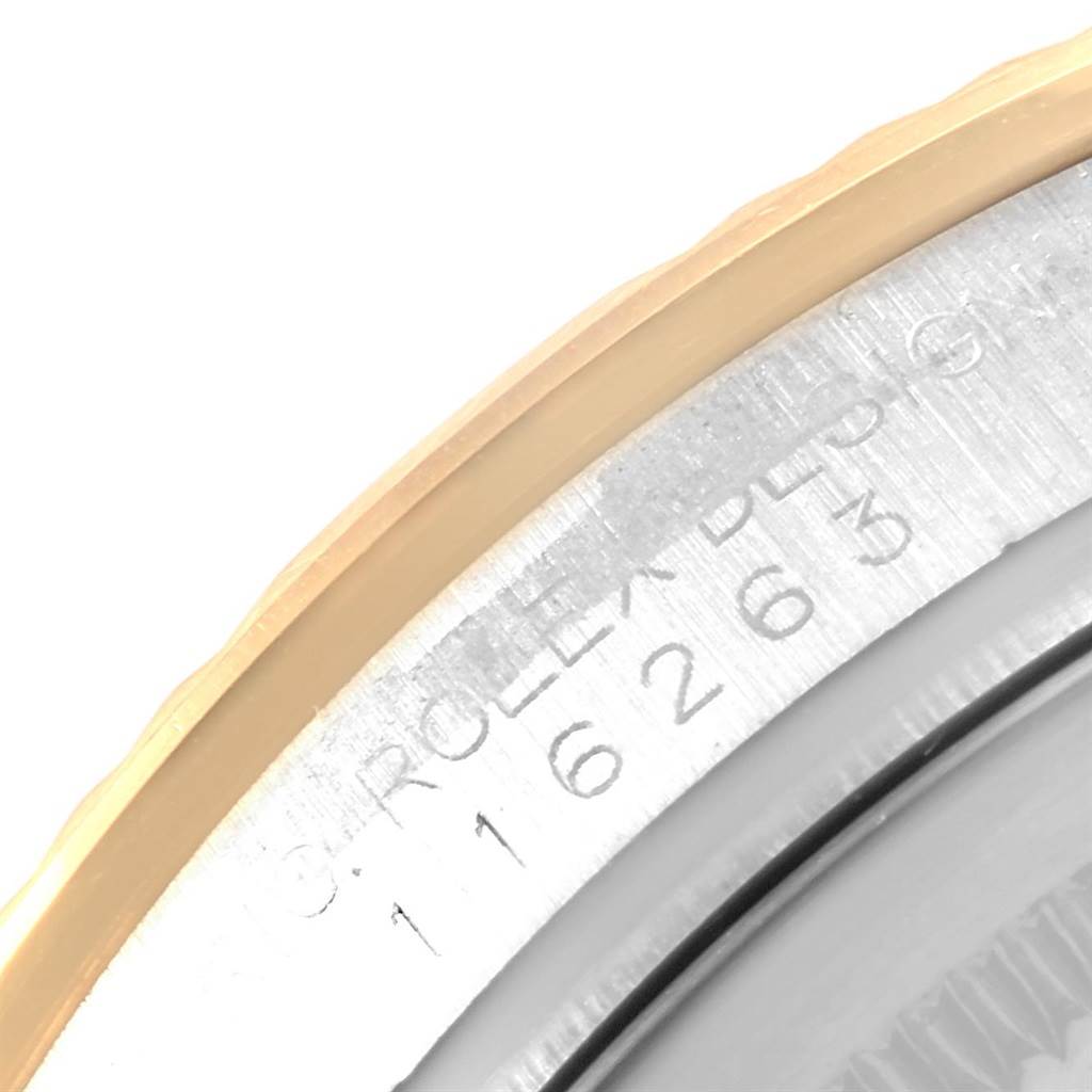 The close-up angle shows a partial view of the bezel and serial number on the Rolex Turn-o-Graph 116263 Men's Steel and Gold (two tone) Grey Dial 116263 Men's Steel and Gold (two tone) Grey Dial watch.