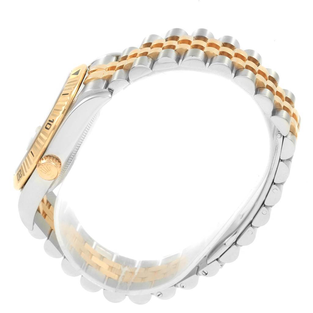 The image shows a side view of a Rolex Turn-o-Graph 116263 Men's Steel and Gold (two tone) Grey Dial 116263 Men's Steel and Gold (two tone) Grey Dial model, focusing on the crown, bezel, and part of the two-tone bracelet.