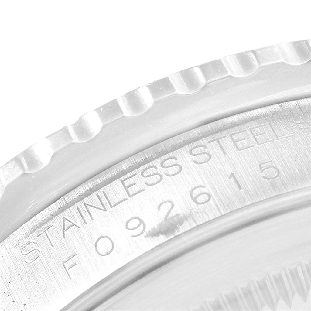 The image shows a close-up of the stainless steel case back and engraved serial number of a Rolex Turn-o-Graph 16264 Men's Stainless Steel Silver Dial 16264 Men's Stainless Steel Silver Dial watch.