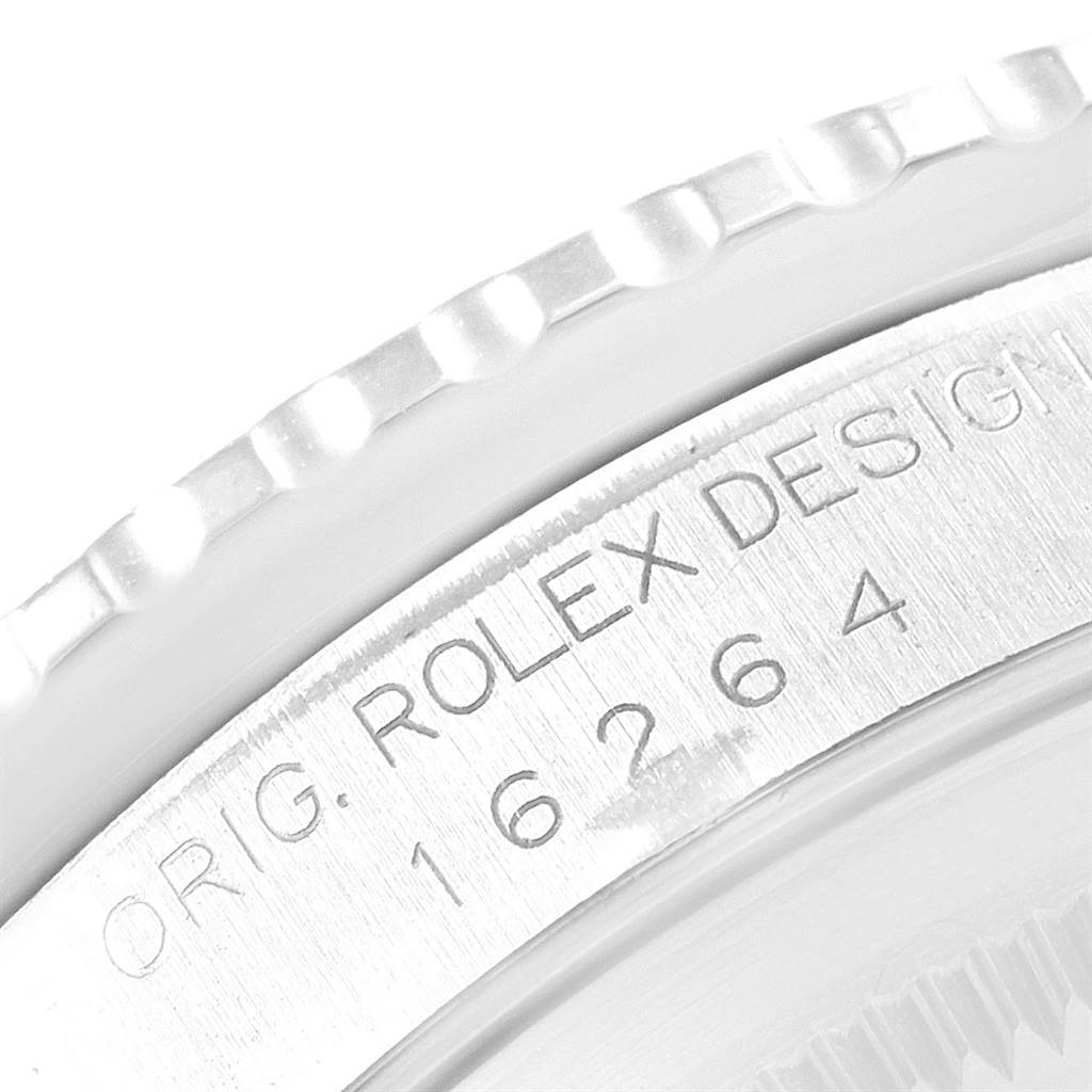 The image shows a close-up view of the serial number and bezel of the Rolex Turn-o-Graph 16264 Men's Stainless Steel Silver Dial 16264 Men's Stainless Steel Silver Dial watch.