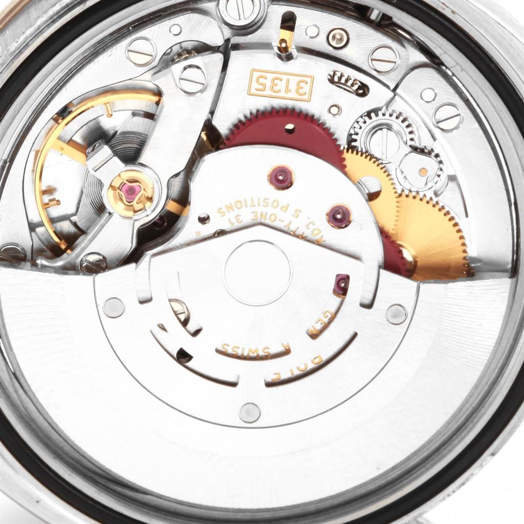The image shows the intricate internal mechanism and movement of a Rolex Turn-o-Graph 116264 Men's Stainless Steel White Dial 116264 Men's Stainless Steel White Dial watch, viewed from the back.