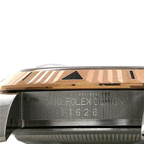 This image shows a side view of a Rolex Turn-o-Graph 116261 Men's Stainless Steel Grey Dial 116261 Men's Stainless Steel Grey Dial watch, highlighting the bezel and the engraved serial number.