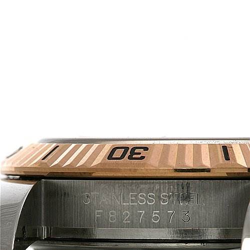 This image shows a close-up side view of a Rolex Turn-o-Graph 116261 Men's Stainless Steel Grey Dial 116261 Men's Stainless Steel Grey Dial watch, featuring the bezel and part of the stainless steel case.