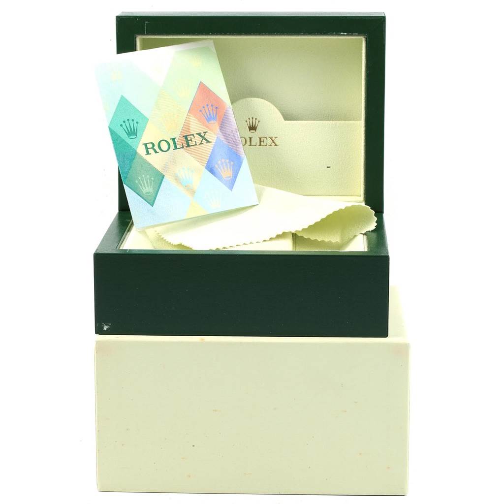 The image shows the packaging and accessories for the Rolex Turn-o-Graph 116263 Men's Stainless Steel White Dial 116263 Men's Stainless Steel White Dial, including a box, booklet, and cleaning cloth.