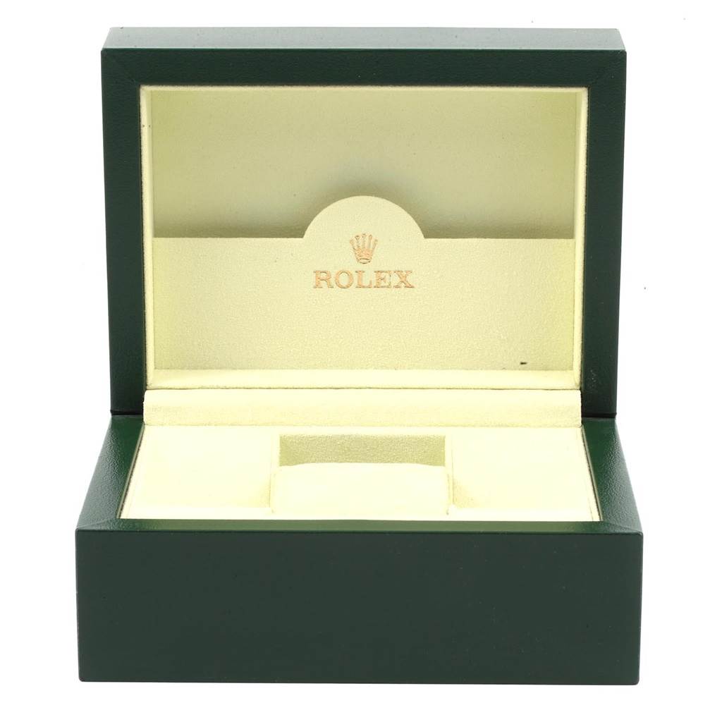 This image shows an open green and beige Rolex watch box, without the Turn-o-Graph model inside.