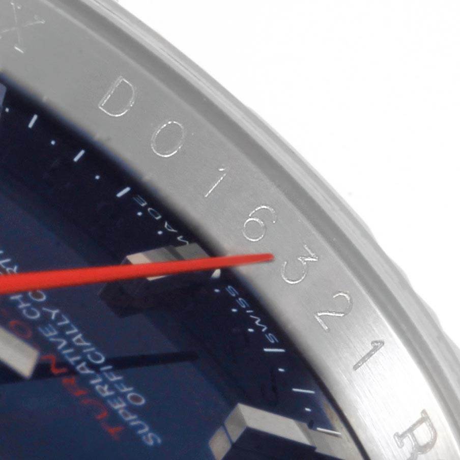 The image shows a close-up of the bezel and dial of a Rolex Turn-o-Graph 116264 Men
s Stainless Steel Blue Dial 116264 Men
s Stainless Steel Blue Dial watch, highlighting the numbers and markings.