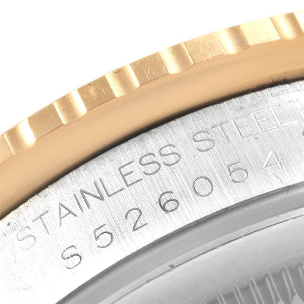 The image shows a close-up of the stainless steel case back and the edge of the bezel of a Rolex Turn-o-Graph 16263 Men's Steel and Gold (two tone) Champagne Dial 16263 Men's Steel and Gold (two tone) Champagne Dial watch.
