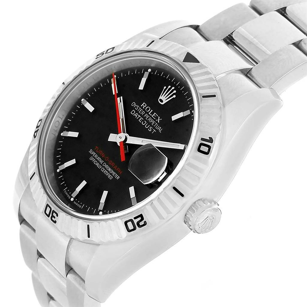 The image shows a side angle of a Rolex Turn-o-Graph 116264 Men
s Stainless Steel Black Dial 116264 Men
s Stainless Steel Black Dial, featuring its dial, bezel, crown, and part of the bracelet.