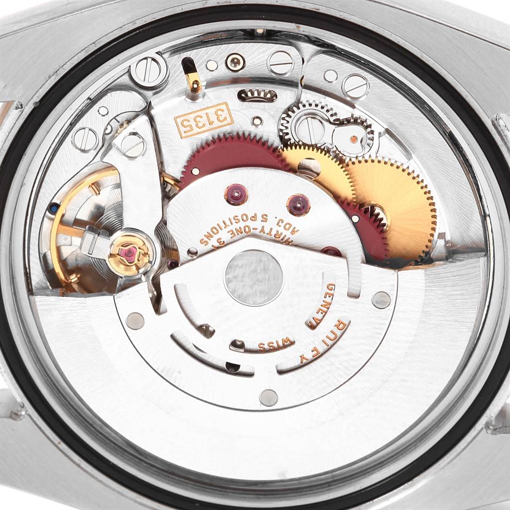 This image shows the internal mechanical movement of a Rolex Turn-o-Graph 116261 Men
s Stainless Steel White Dial 116261 Men
s Stainless Steel White Dial watch from a rear, open-back angle.