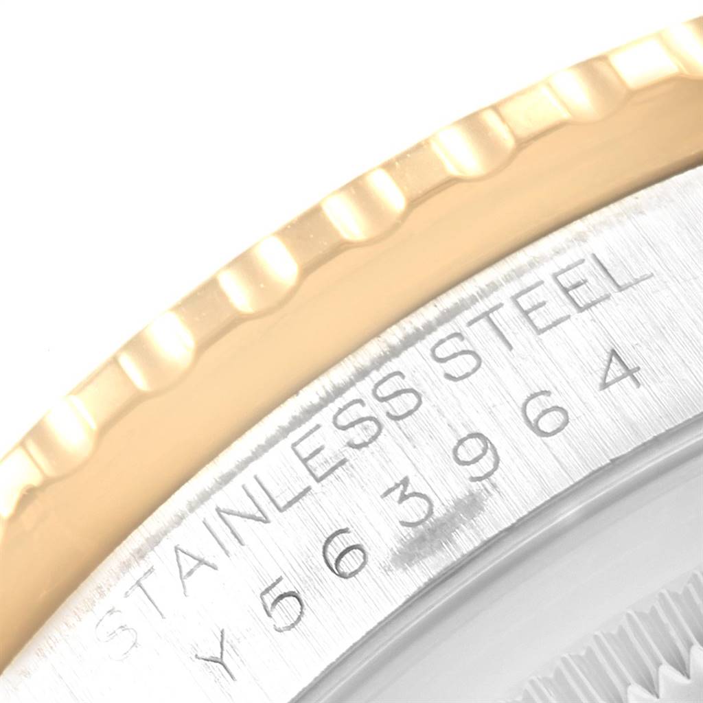 This image shows a close-up of the bezel and serial number engraving on a Rolex Turn-o-Graph 16263 Men's Steel and Gold (two tone) Beige Dial 16263 Men's Steel and Gold (two tone) Beige Dial watch.
