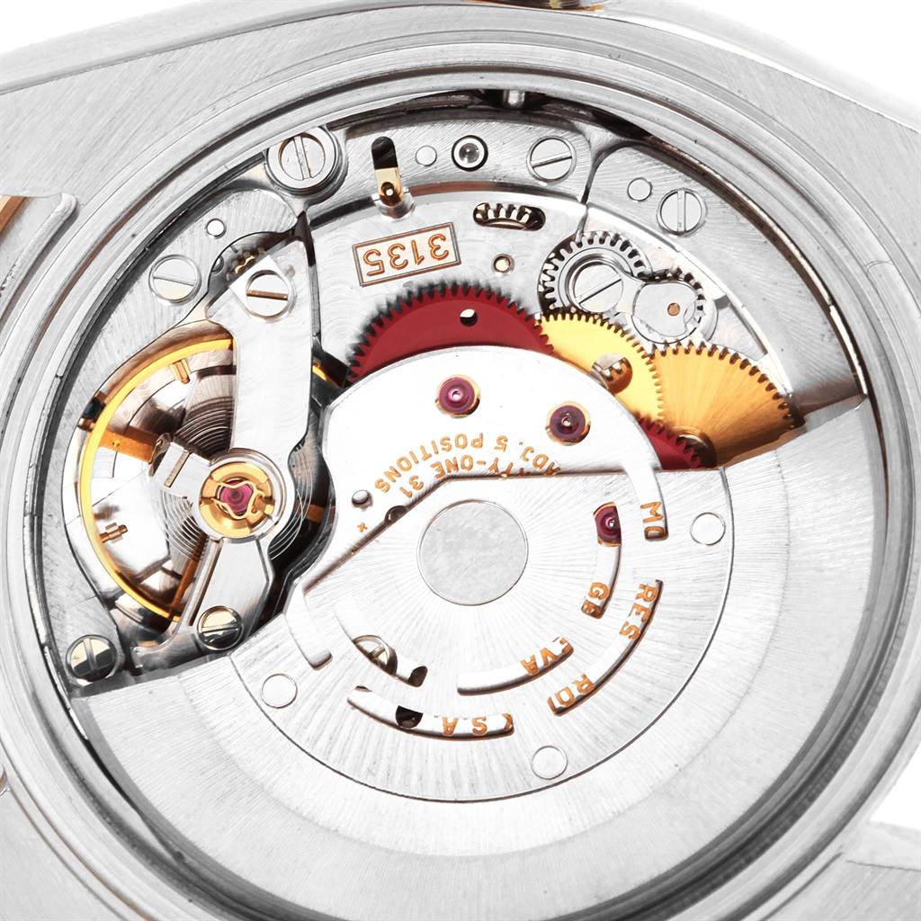 The image shows a close-up of the internal mechanical movement of a Rolex Turn-o-Graph 116263 Men
s Stainless Steel White Dial 116263 Men
s Stainless Steel White Dial watch at a direct angle.