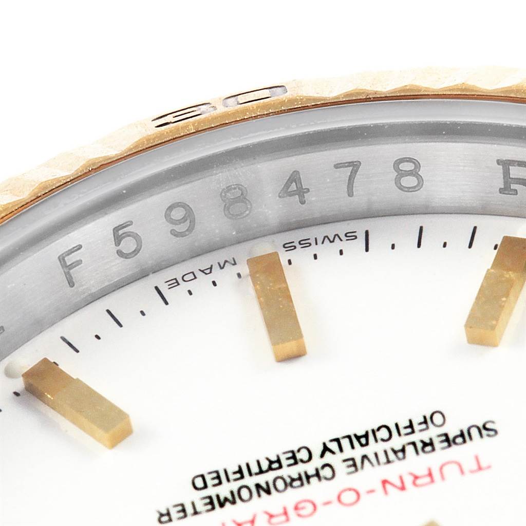 The image shows a close-up of the dial and bezel of a Rolex Turn-o-Graph 116263 Men
s Stainless Steel White Dial 116263 Men
s Stainless Steel White Dial watch, highlighting the markers and "Swiss Made" inscription.