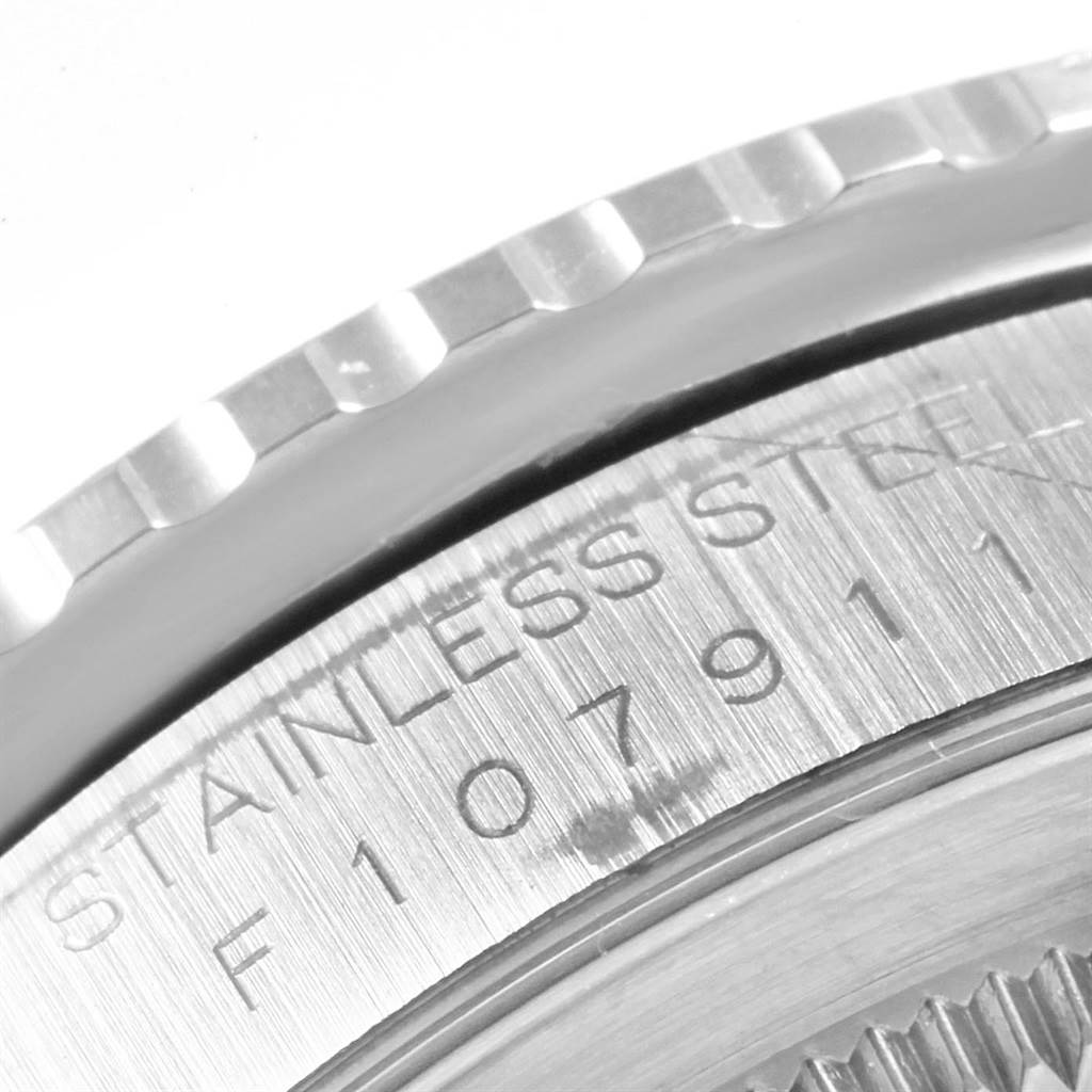 The image shows a close-up of the stainless steel engraving and the bezel edge of the Rolex Turn-o-Graph 16264 Men
s Stainless Steel White Dial 16264 Men
s Stainless Steel White Dial watch.