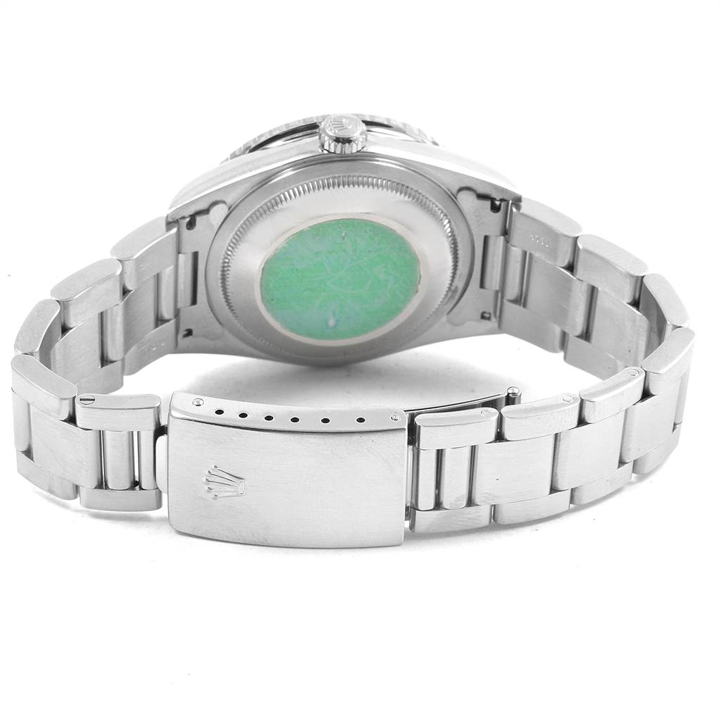 The image shows the back case and clasp of a Rolex Turn-o-Graph 16264 Men
s Stainless Steel Black Dial 16264 Men
s Stainless Steel Black Dial watch, with the band partially extended.