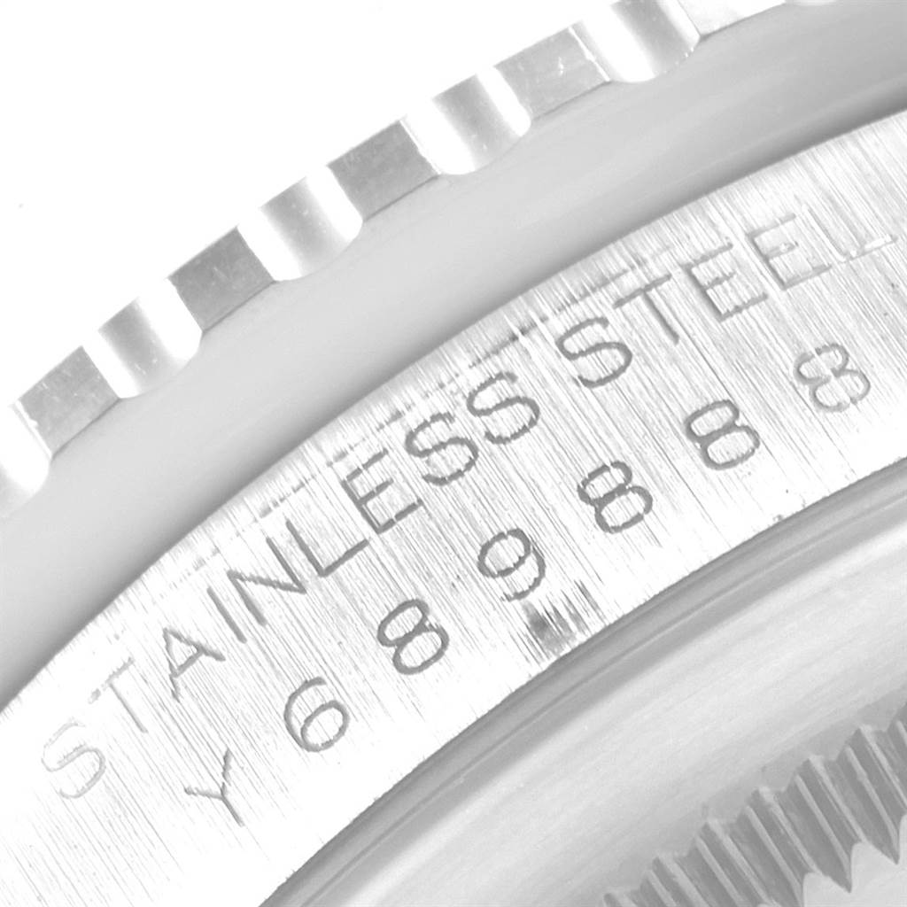 The image shows a close-up of the stainless steel bezel and part of the casing of a Rolex Turn-o-Graph 16264 Men
s Stainless Steel Black Dial 16264 Men
s Stainless Steel Black Dial watch.