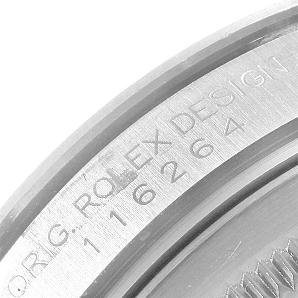 The image shows a close-up of the engraved bezel of a Rolex Turn-o-Graph 116264 Men
s Stainless Steel White Dial 116264 Men
s Stainless Steel White Dial watch, highlighting the model number "116264."