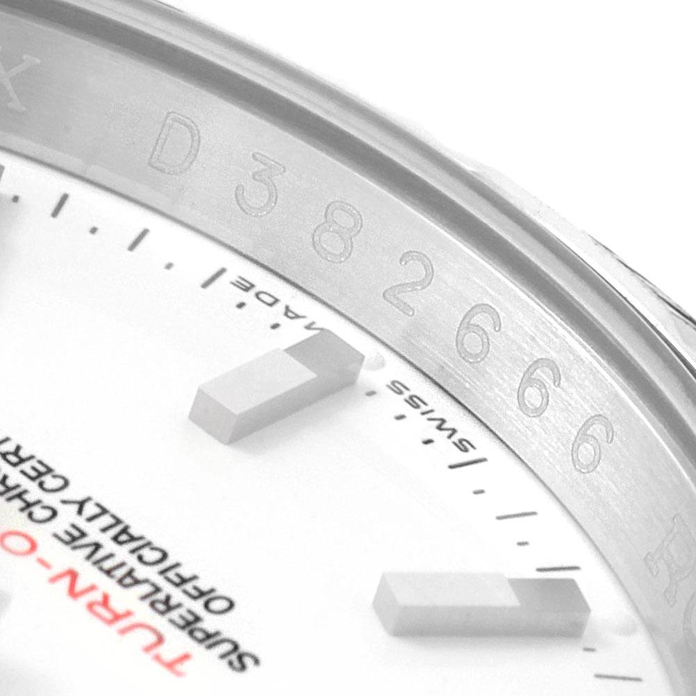 The image shows a close-up angle of the bezel and a portion of the dial of the Rolex Turn-o-Graph 116264 Men
s Stainless Steel White Dial 116264 Men
s Stainless Steel White Dial watch.
