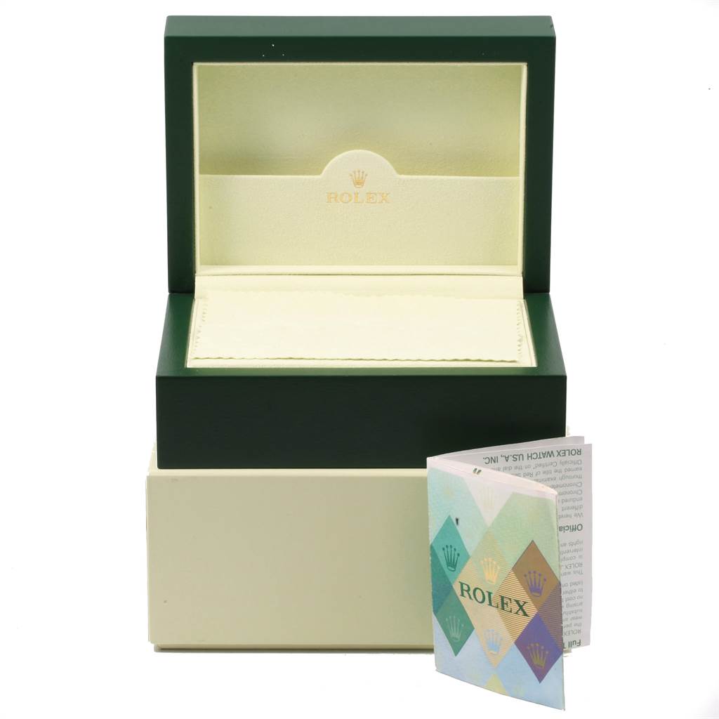 The image shows a green Rolex Turn-o-Graph 116264 Men
s Stainless Steel Blue Dial 116264 Men
s Stainless Steel Blue Dial watch box with an open lid and an accompanying instruction booklet.