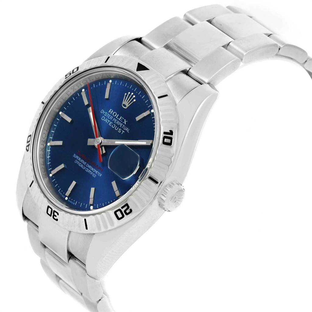 The image shows a side-angle view of the Rolex Turn-o-Graph 116264 Men
s Stainless Steel Blue Dial 116264 Men
s Stainless Steel Blue Dial watch, highlighting its bezel, dial, crown, and bracelet.