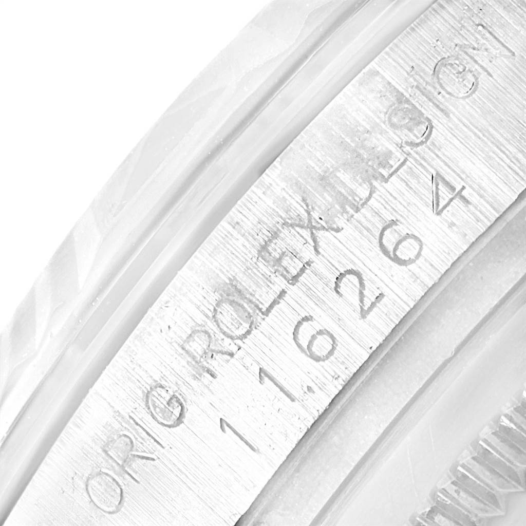 This image shows a close-up of the engraved bezel of a Rolex Turn-o-Graph 116264 Men
s Stainless Steel Blue Dial 116264 Men
s Stainless Steel Blue Dial model watch.