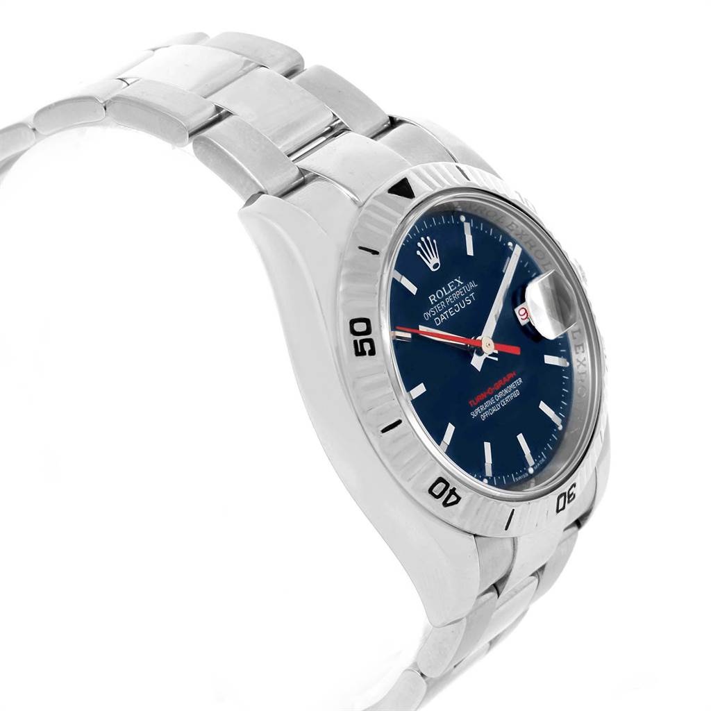 The image shows a side angle of the Rolex Turn-o-Graph 116264 Men
s Stainless Steel Blue Dial 116264 Men
s Stainless Steel Blue Dial watch highlighting its bracelet and round bezel with a blue dial.