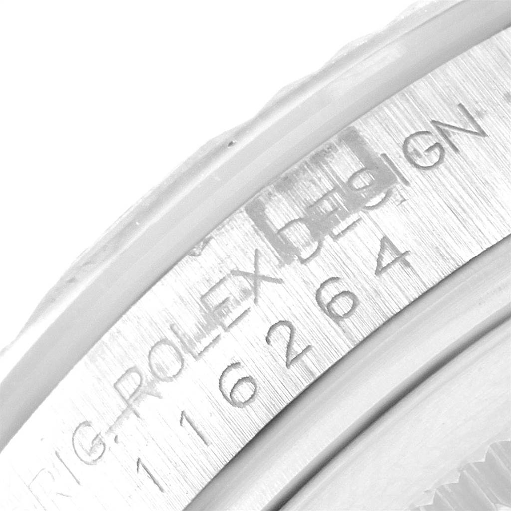 This image shows a close-up of the engraving on the side of the Rolex Turn-o-Graph 116264 Men
s Stainless Steel White Dial 116264 Men
s Stainless Steel White Dial model, displaying part numbers and the brand name.